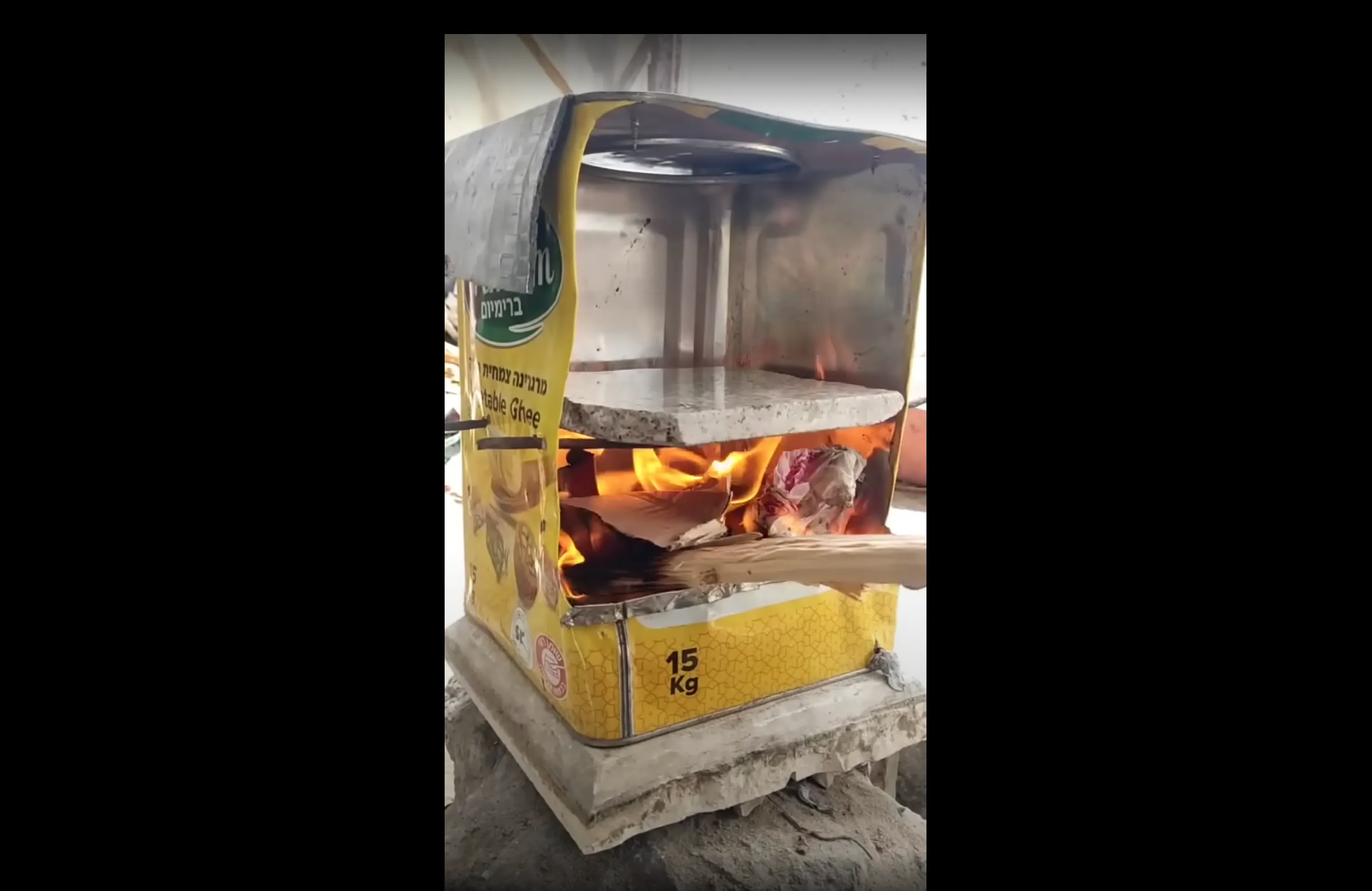 DIY stove from tin cans - image